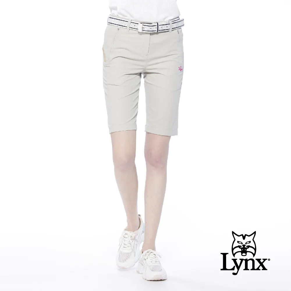 【Lynx Golf】女款吸濕排汗彈性布料滿版Lynx字樣口袋配色織帶設計窄管長褲(二色) 歷史價格詳細信息