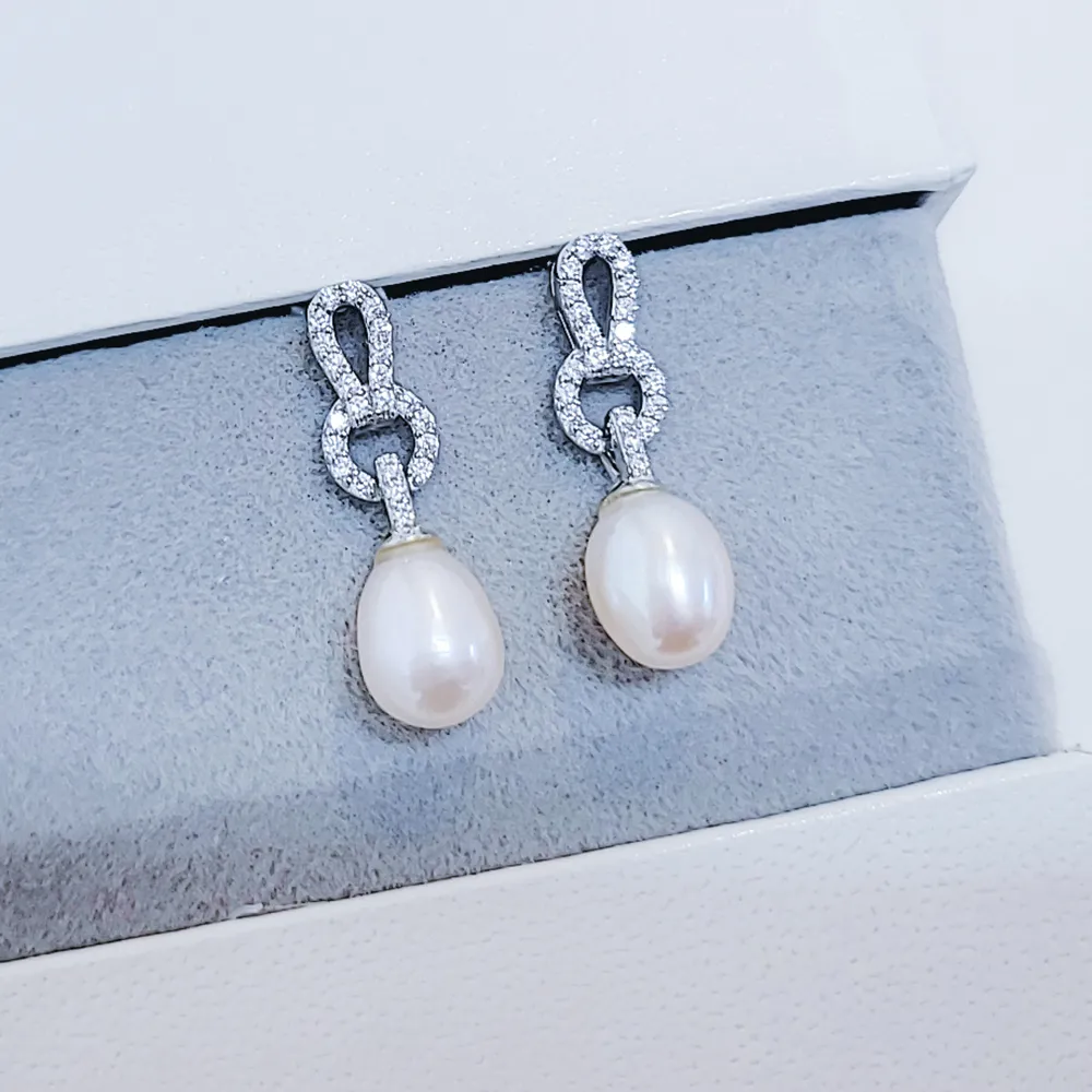 【焦糖小姐 Ms caramelo】淡水珍珠&白水晶 兔寶貝手鍊 歷史價格詳細信息