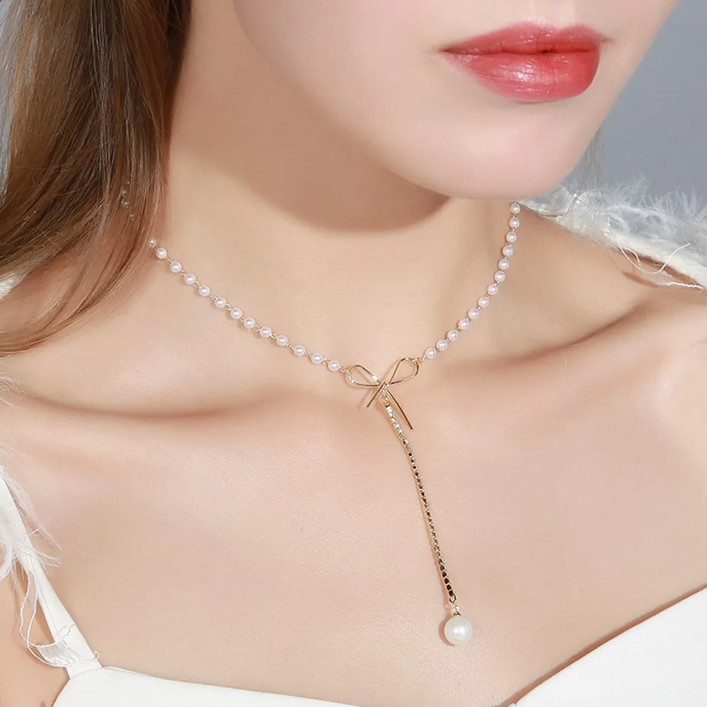 氣質珍珠蝴蝶結圓牌瀨兔毛球吊飾包包掛飾鑰匙圈 歷史價格詳細信息