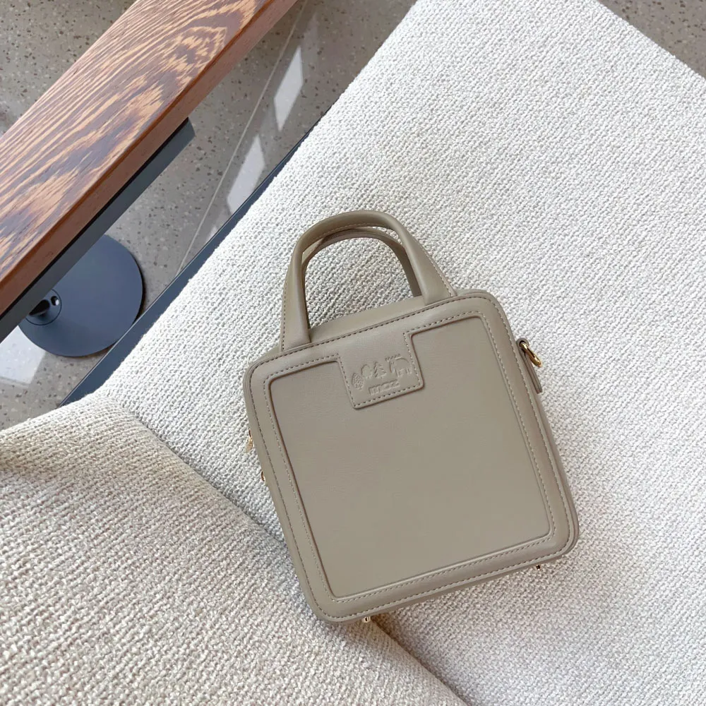 moz瑞典 駝鹿 皮革 防潑水 斜背相機包 (栗子色) 歷史價格詳細信息