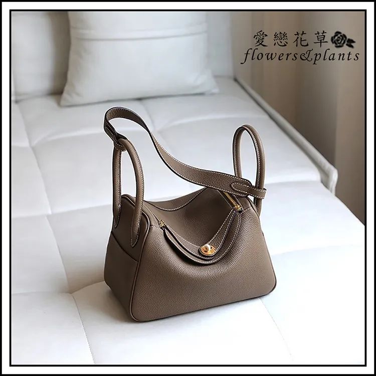 黑色時尚真皮後背包,底寬32.5*15.5cm,高度34cm,全新未用標籤未剪降價大出清 歷史價格詳細信息