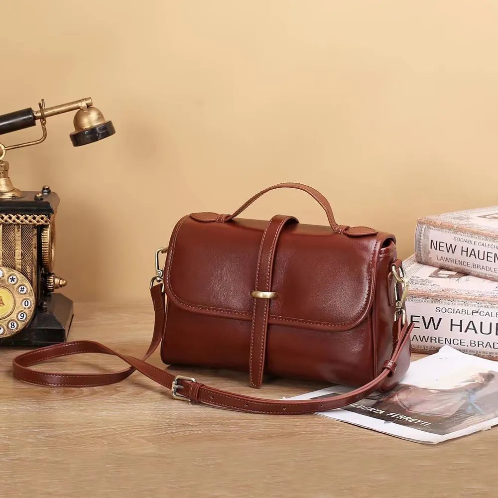 【伊卡柔Ikary】劍橋郵差包頭層植鞣牛皮新款女包(9257日落黃) 歷史價格詳細信息