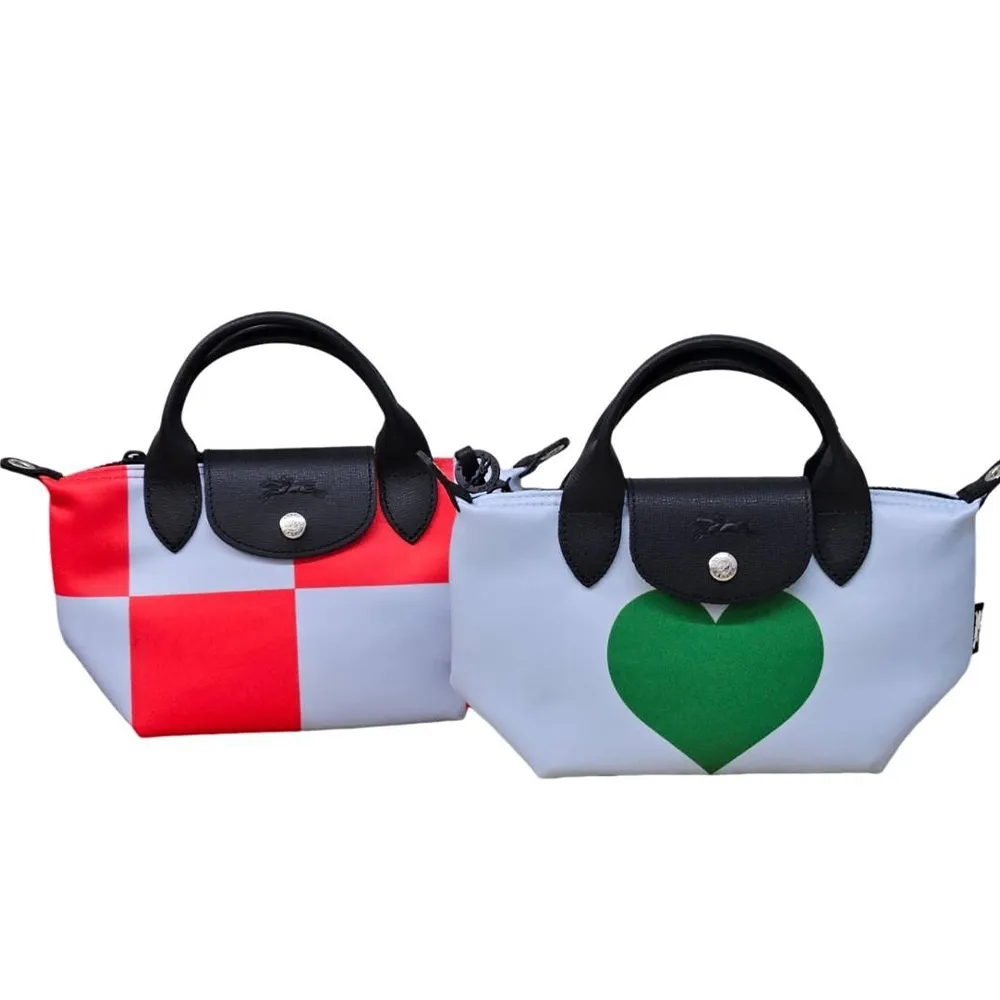 LONGCHAMP LE PLIAGE系列再生帆布奔馬撞色斜背包(迷你/粉紅) 歷史價格詳細信息