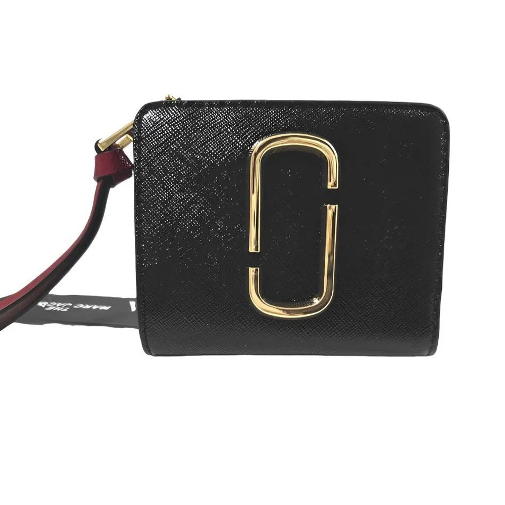 MARC JACOBS 專櫃中性款 牛皮荔枝紋八卡短夾-焦糖色 歷史價格詳細信息