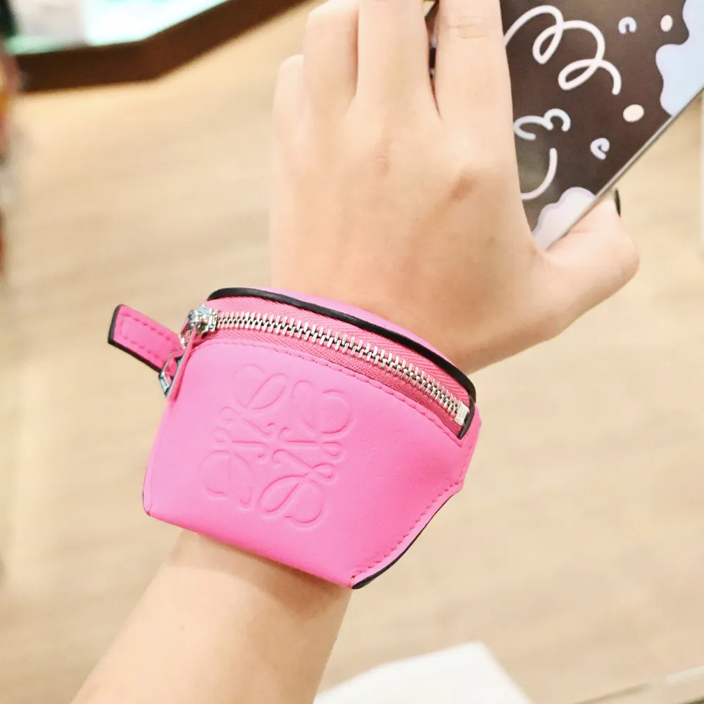 LOEWE 烙印LOGO撞色小牛皮釦式零錢短夾.亮橘 歷史價格詳細信息