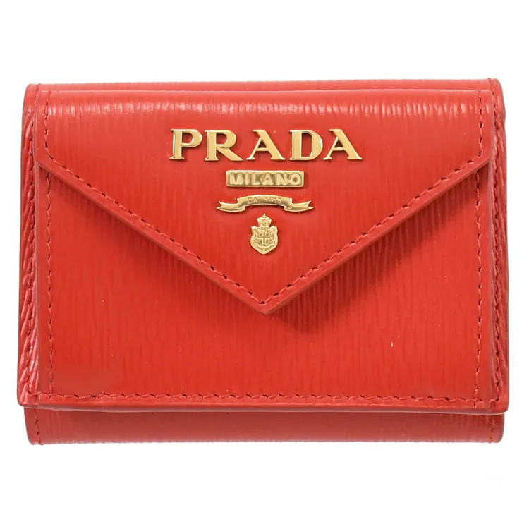 PRADA 浮雕壓印三角牌Logo 防刮皮革對開8卡短夾(黑色) 2MO513 2D1Q F0002 歷史價格詳細信息