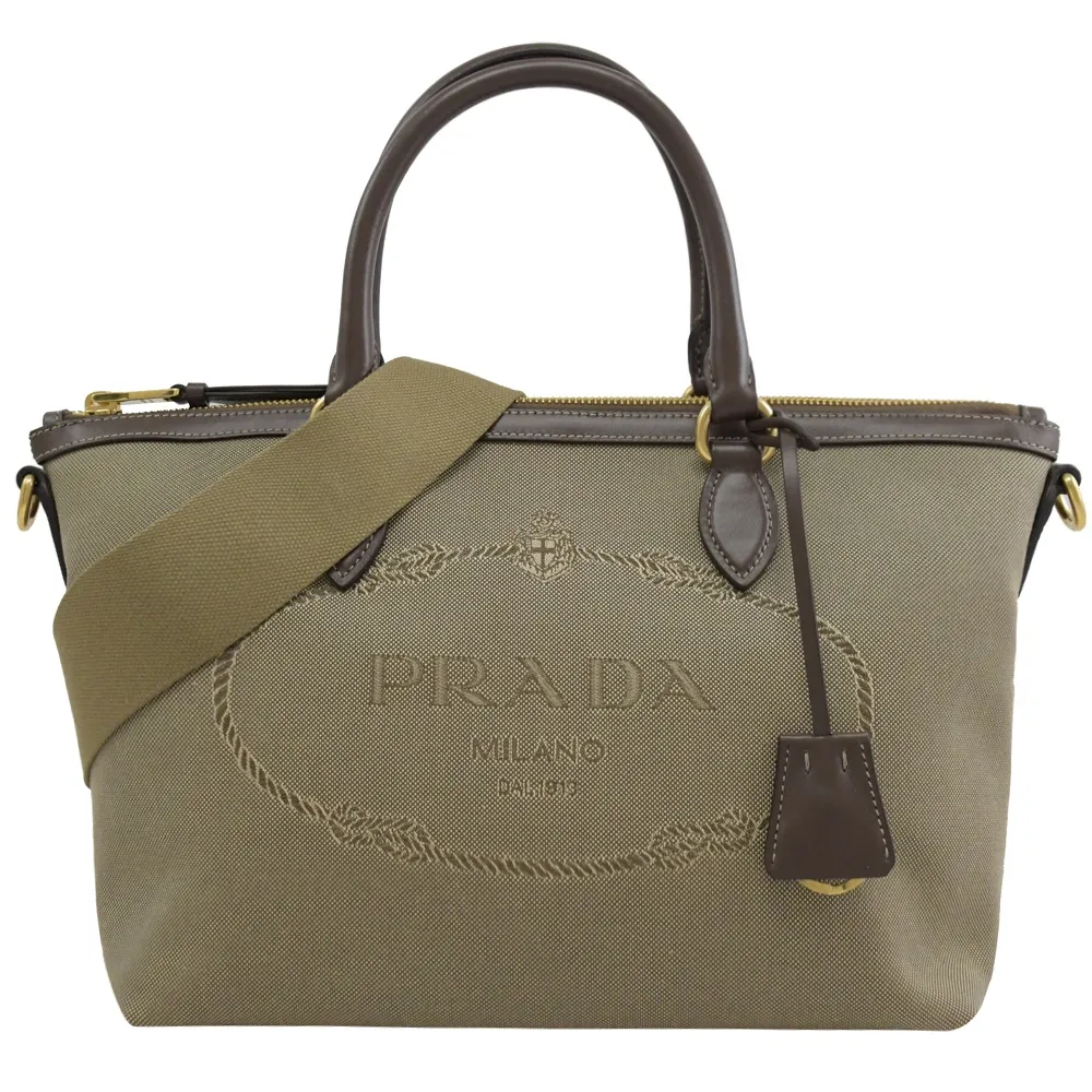 PRADA 1BA104 浮雕LOGO尼龍防刮拼接手提斜背兩用包.黑 歷史價格詳細信息