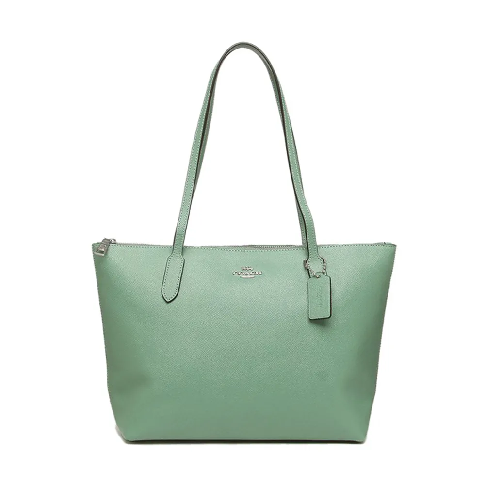 COACH 經典馬車素面牛皮斜背半月包(奶油黃x果綠) 歷史價格詳細信息