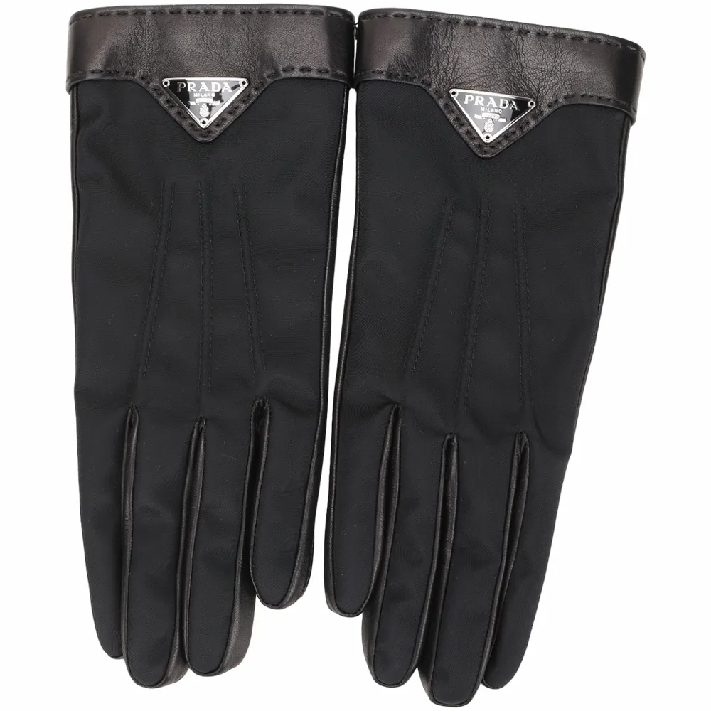 Prada 尼龍羊皮兩用包。背帶有重新送修，可正常使用，售出不退換貨，請考慮清楚再訂購 歷史價格詳細信息