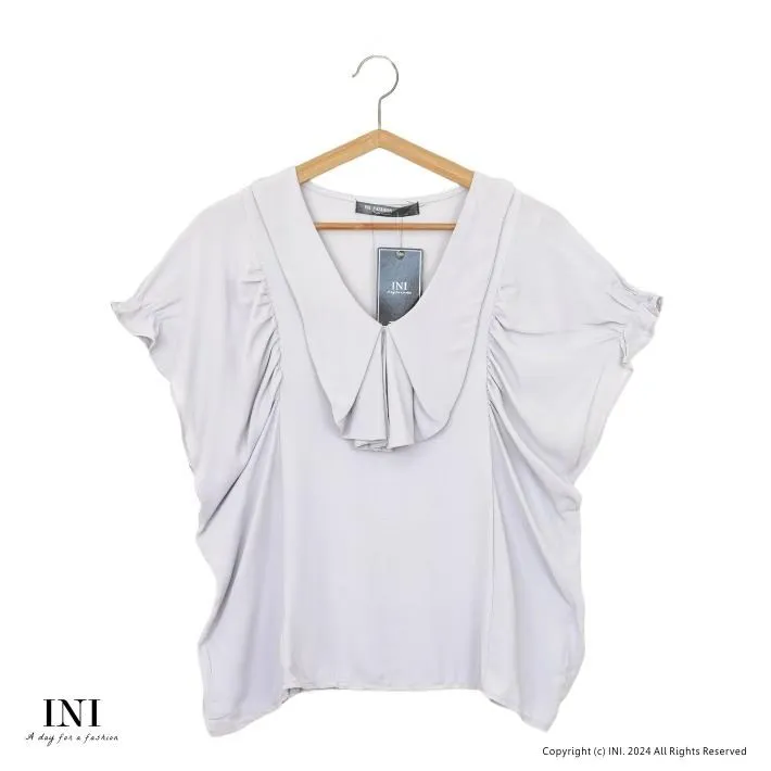 【INI】輕鬆穿搭、真兩件式條紋慵懶感連袖上衣．水藍色 歷史價格詳細信息