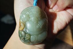 和闐玉獨籽料  黃皮白肉巧雕公母貔貅和田玉獨籽28.4g 歷史價格詳細信息