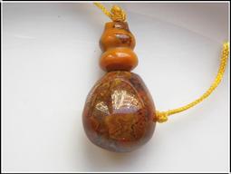 藏傳紅瑪瑙牛角天珠。珠子老氣感十足 包漿醇厚 風化細膩 風化20389 歷史價格詳細信息