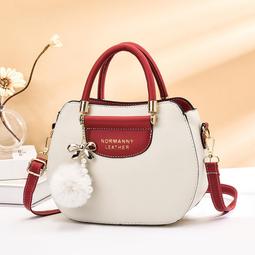 ６９９免運丷春季新款時尚質感星星掛墜女款簡約單肩斜挎手提女包旅行包外出包收納包休閒包丷SD17100 歷史價格詳細信息