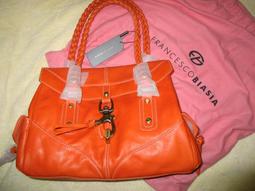 橘色真皮側肩背圓筒包,底外圓直徑12.5cm,高度34cm,有使用痕跡,降價大出清 歷史價格詳細信息