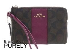【COACH】深咖啡PVC立體LOGO雙拉鍊手拿包 歷史價格詳細信息