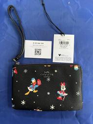 DISNEY X COACH 聯名系列手拿包-粉色米奇米妮溜冰  全新含吊牌保證正品 歷史價格詳細信息
