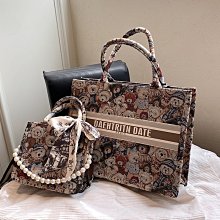 今年流行大容量條紋包包女2023新款簡約尼龍布水桶包小眾潮腋下包-Misaki精品 歷史價格詳細信息