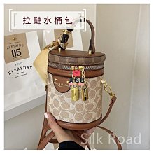 小眾拼色包包水桶斜跨手提簡約百搭2023夏季新品原創個性森系女包 歷史價格詳細信息