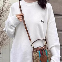 COACH蔻馳 Dempsey 14金典標誌條紋logo貼飾 水桶包手提單肩斜挎包 女款 金色 C8322 歷史價格詳細信息