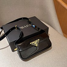 二手Prada 普拉達1BD314 牛皮相機包 郵差包 織物肩帶 寬肩帶款 歷史價格詳細信息