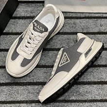 PRADA 品牌標誌黑尼龍布皮飾邊斜肩包 歷史價格詳細信息