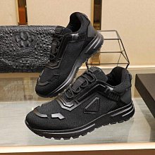 PRADA 品牌標誌黑尼龍布皮飾邊斜肩包 歷史價格詳細信息