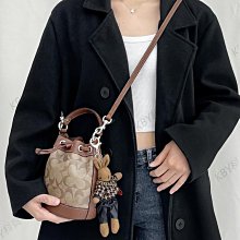 COACH蔻馳 Dempsey 14金典標誌條紋logo貼飾 水桶包手提單肩斜挎包 女款 金色 C8322 歷史價格詳細信息