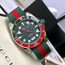 GUCCI Dive Automatic 銀色錶盤 橘色配綠色橡膠錶帶 男士 自動機械錶 YA136351 潛水錶 中性錶 歷史價格詳細信息
