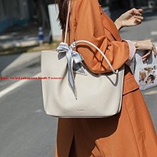 簡約大容量托特包 2022新款 学生 PU手提女包 高级感爱心大包包 百搭单肩包 水桶包--麥包包 歷史價格詳細信息