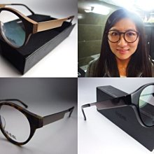 【Alain Mikli】法國時尚週歐美橢圓 造型太陽眼鏡(黑色/棋盤格 AL1306-A02D) 歷史價格詳細信息