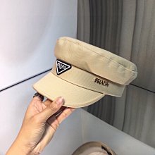 【熱賣精選】PRADA 倒三角標貝雷帽子女秋季情侶款復古畫帽子百搭時尚潮流帽子子男女 歷史價格詳細信息