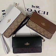 Coach 手拿包 零錢包 藍綠 防刮 PVC 材質 現貨 附購買收據 正品 原廠 歷史價格詳細信息