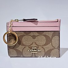 就愛精品店❤️  Kipling 卡其色素面尼龍材質兩用斜背/書包 +金色三層收納包 歷史價格詳細信息