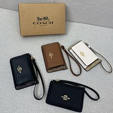 COACH C6433 馬車LOGO皮革絨布拼接兩用酒神包.深藍 歷史價格詳細信息