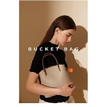 手提包 水桶包 高級感洋氣小包包女2024新款流行寬肩帶斜挎包時尚爆款通勤水桶包-悅享樂購滿599免運 歷史價格詳細信息