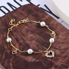 KATE SPADE 珍珠母貝愛心耳環-金色 歷史價格詳細信息