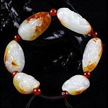 籽料佛新疆和闐玉籽料獨籽黃沁紅沁彌勒佛一夜成佛大葉吊墜掛件， 歷史價格詳細信息